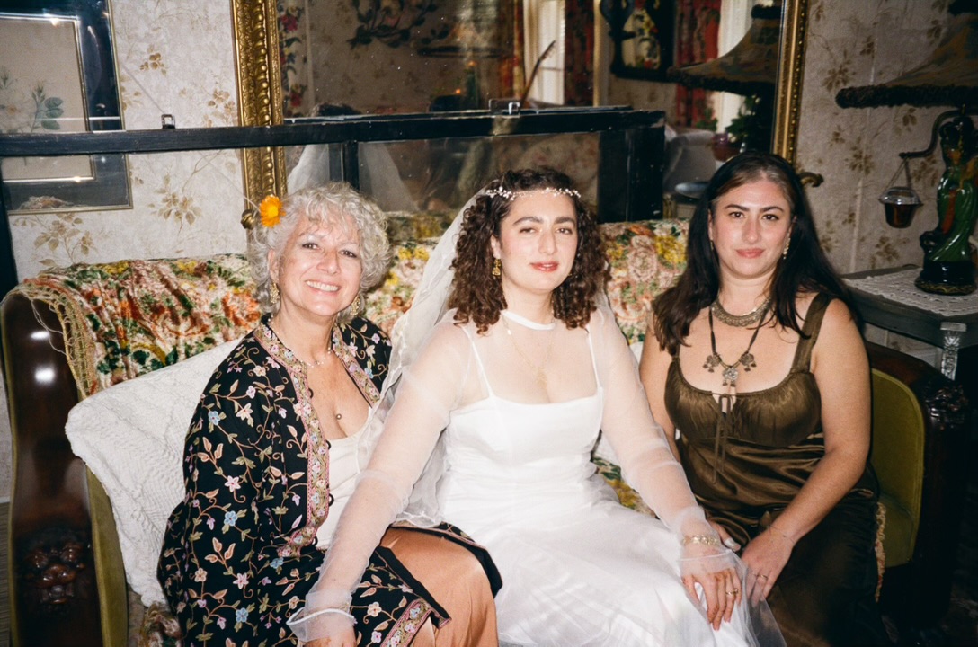 Bride with family in the sitting room