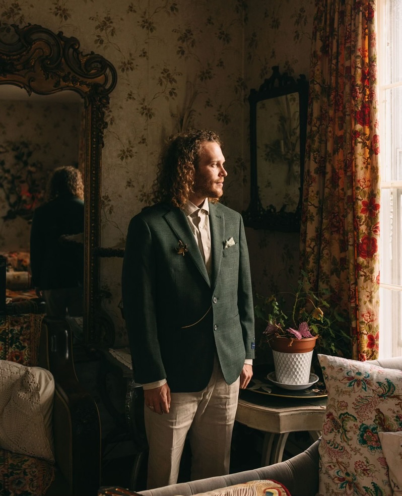 A wedding portrait by the window