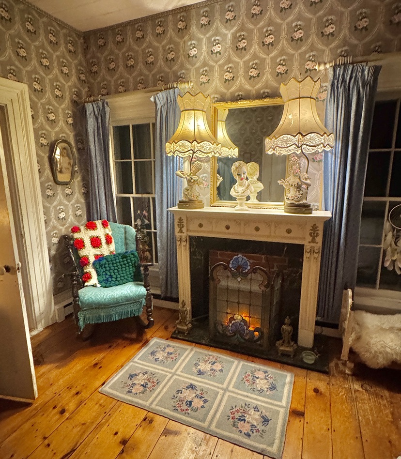 Original fireplace and patterned sitting-room walls