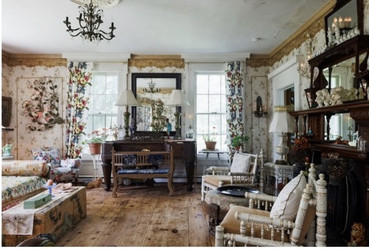 Drawing room with a piano and tall windows