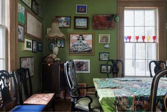 Dining table beside a sunlit window