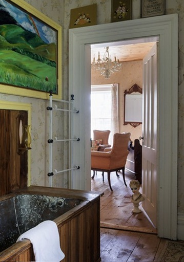 Bathroom with a view into an adjoining room