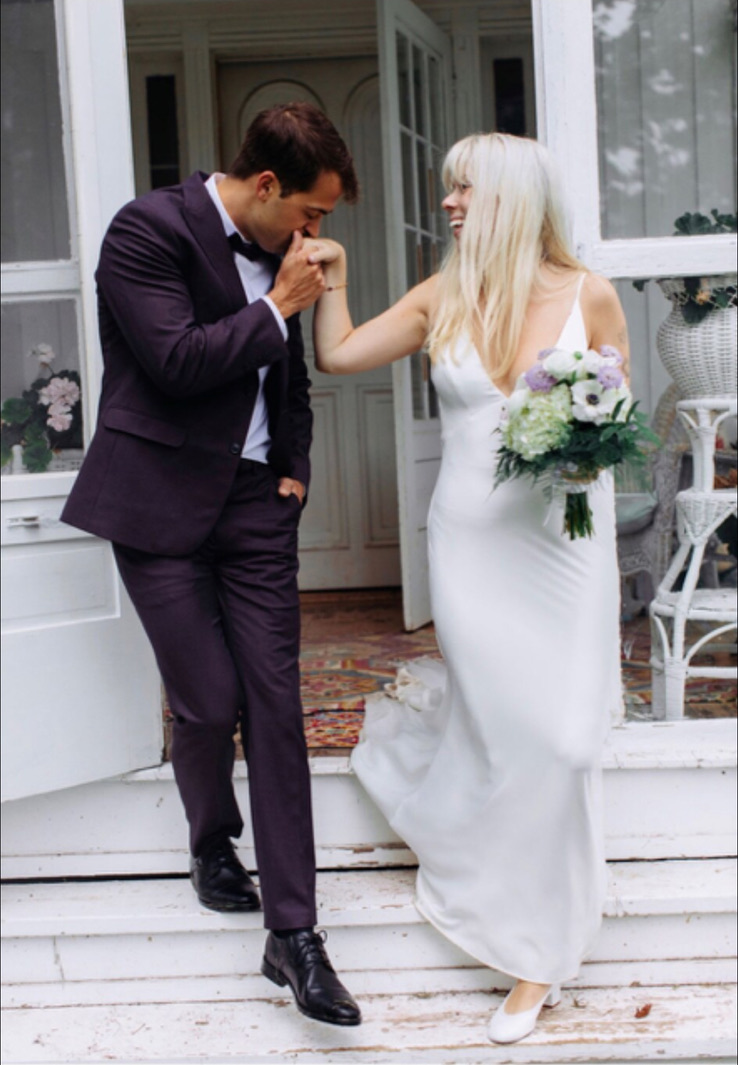 A wedding moment on the front steps